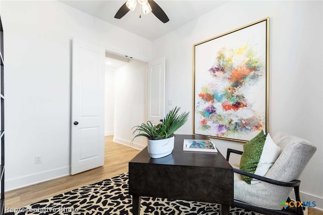 office area with hardwood / wood-style flooring and ceiling fan