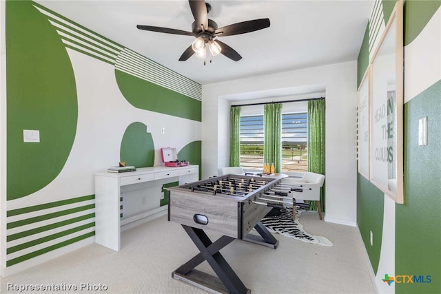 game room featuring ceiling fan and light colored carpet