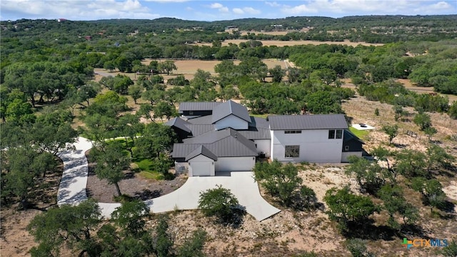 aerial view featuring a view of trees