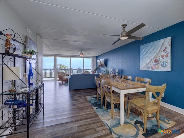 6021 State Highway 361 Unit 108, Port Aransas, TX 78373 - dining space with ceiling fan and wood finished floors