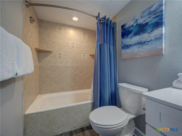 6021 State Highway 361 Unit 108, Port Aransas, TX 78373 - full bathroom featuring toilet, tiled shower / bath combo, recessed lighting, and vanity