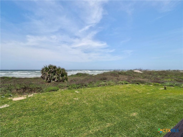 6021 State Highway 361 Unit 108, Port Aransas, TX 78373 - view of green lawn featuring a water view