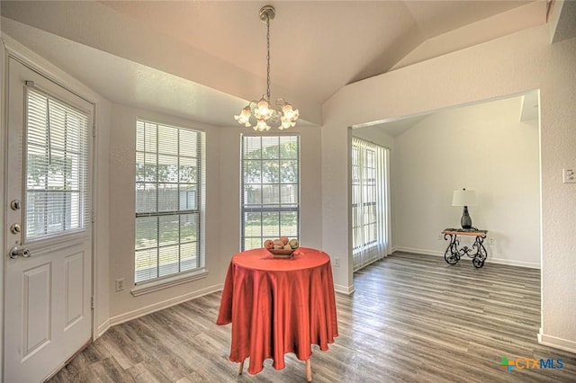 204 James Loop, Killeen, TX 76542 - dining room featuring a chandelier, wood finished floors, lofted ceiling, and baseboards