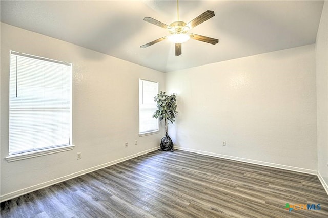 204 James Loop, Killeen, TX 76542 - empty room with dark wood-type flooring, ceiling fan, and baseboards