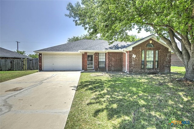 204 James Loop, Killeen, TX 76542 - ranch-style house featuring concrete driveway, brick siding, and a garage
