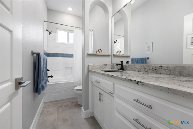 full bathroom featuring vanity, toilet, and shower / bath combo with shower curtain