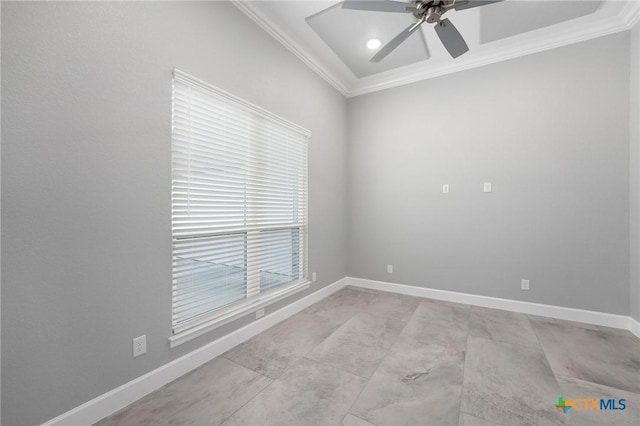 empty room featuring crown molding and ceiling fan