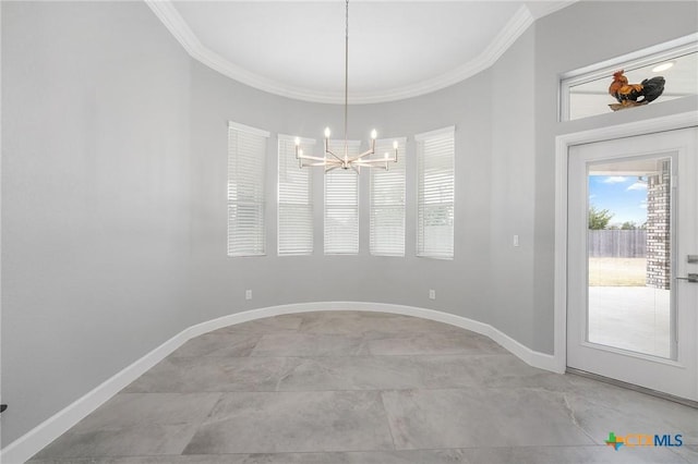 interior space with a notable chandelier and crown molding