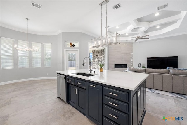 kitchen featuring sink, crown molding, dishwasher, a kitchen island with sink, and hanging light fixtures