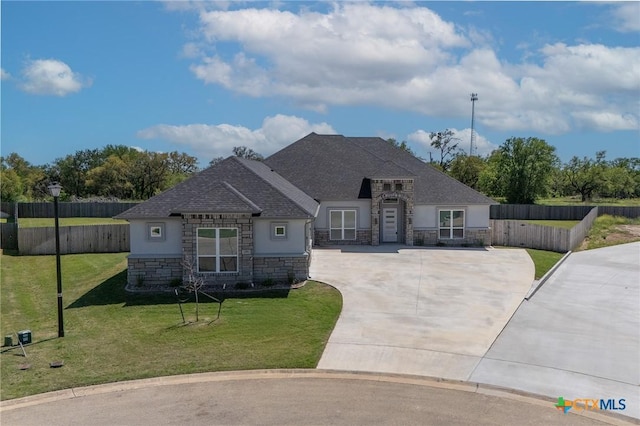 116 Vista De Luna Ln, Belton, TX 76513 - french provincial home featuring stucco siding, stone siding, a front lawn, a shingled roof, and concrete driveway