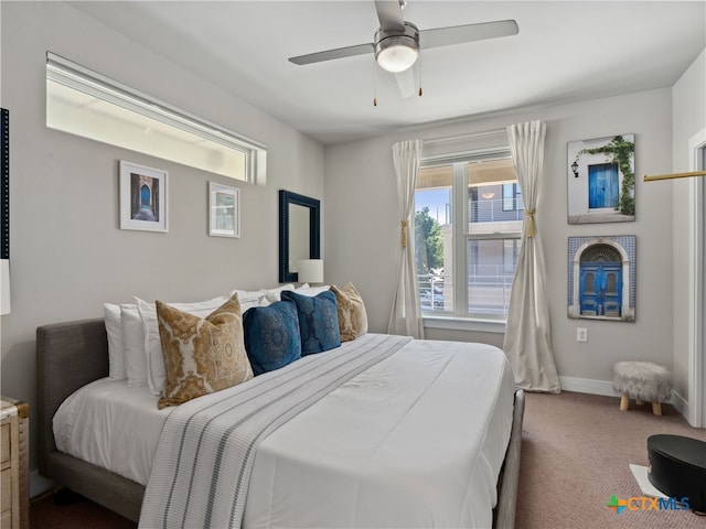 bedroom featuring ceiling fan and carpet floors