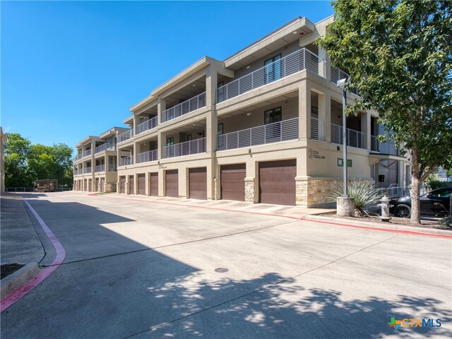 view of building exterior featuring a garage