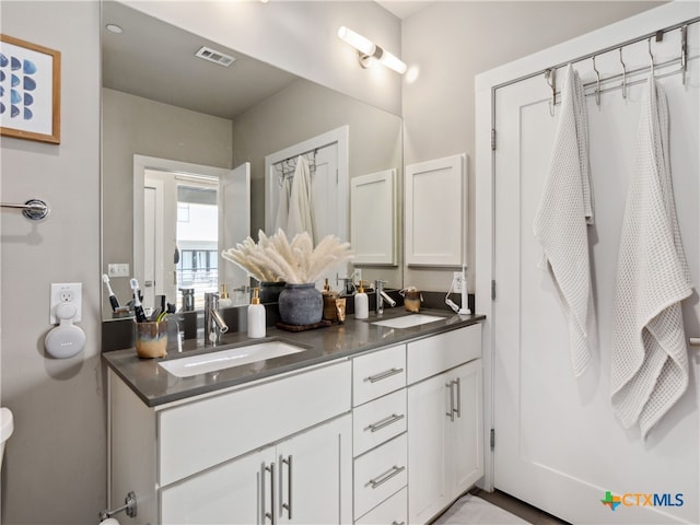 bathroom featuring vanity