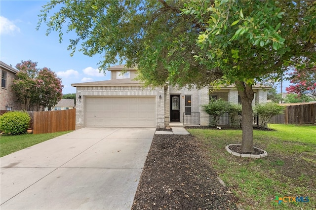 213 Springtree Pkwy, Cibolo, TX 78108 - view of front of property with concrete driveway, brick siding, and a garage