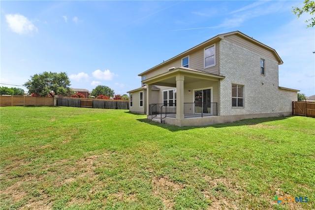 213 Springtree Pkwy, Cibolo, TX 78108 - back of house featuring a fenced backyard, brick siding, and a patio area