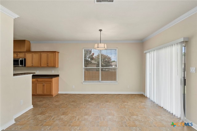 213 Springtree Pkwy, Cibolo, TX 78108 - unfurnished dining area with stone finish flooring and crown molding