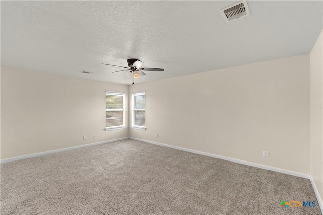 213 Springtree Pkwy, Cibolo, TX 78108 - carpeted empty room featuring a ceiling fan and a textured ceiling