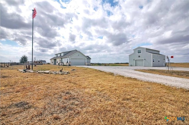 view of yard with a garage