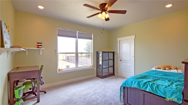 carpeted bedroom with ceiling fan