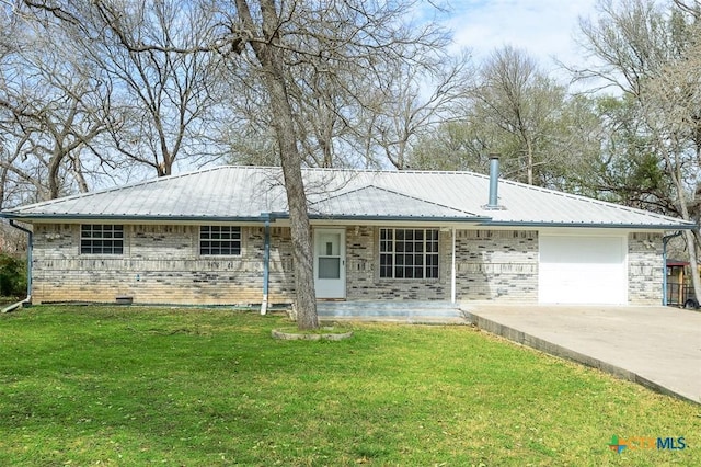 single story home featuring a garage, a front yard, metal roof, and brick siding