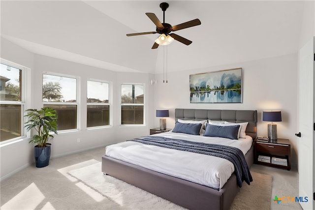 bedroom featuring ceiling fan, carpet floors, lofted ceiling, and baseboards