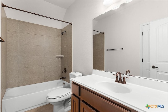 bathroom featuring shower / washtub combination, vanity, and toilet