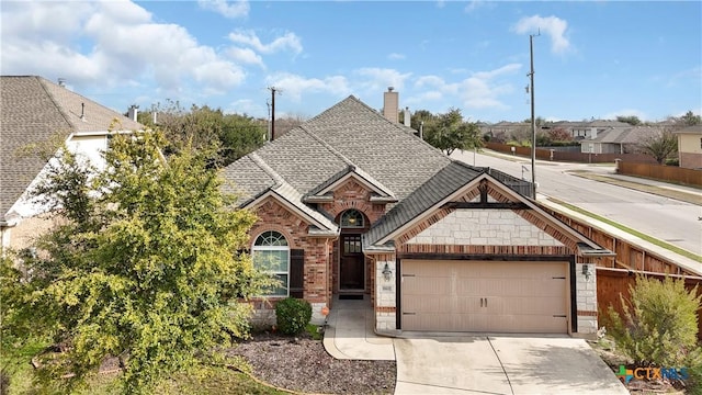 view of front of property featuring a garage