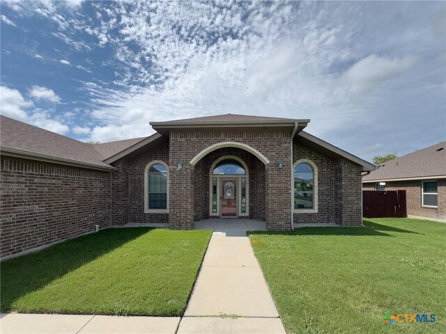 1403 Excel Dr, Killeen, TX 76542 - view of front of house with brick siding and a shingled roof