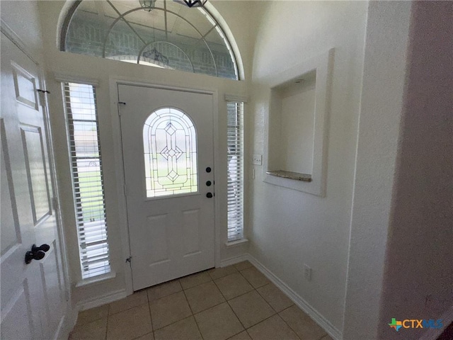 1403 Excel Dr, Killeen, TX 76542 - entrance foyer with light tile patterned floors and plenty of natural light