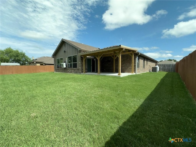 1403 Excel Dr, Killeen, TX 76542 - rear view of house featuring a patio, a fenced backyard, and board and batten siding