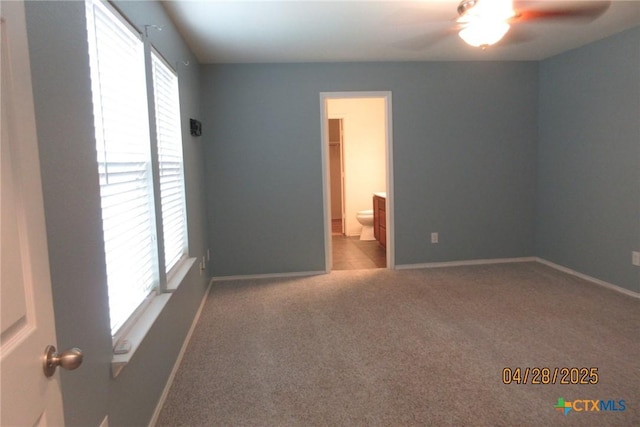9202 Sage Valley Dr, Temple, TX 76502 - empty room with healthy amount of natural light, a ceiling fan, carpet flooring, and baseboards