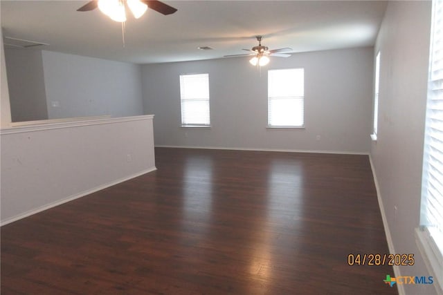 9202 Sage Valley Dr, Temple, TX 76502 - spare room featuring a ceiling fan, wood finished floors, and baseboards