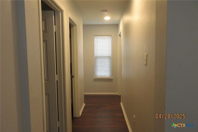 9202 Sage Valley Dr, Temple, TX 76502 - hallway with dark wood-style flooring and baseboards