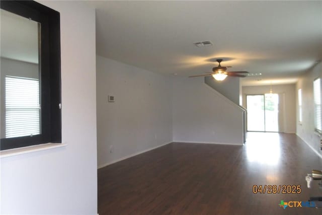 9202 Sage Valley Dr, Temple, TX 76502 - unfurnished living room with wood finished floors, ceiling fan, and baseboards