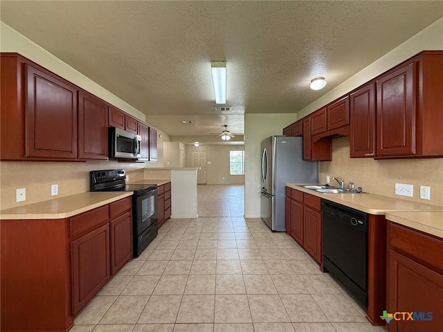 3608 Doffy Dr, Killeen, TX 76549 - kitchen featuring a textured ceiling, ceiling fan, a sink, black appliances, and light countertops