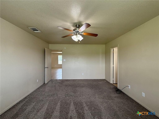 3608 Doffy Dr, Killeen, TX 76549 - carpeted empty room featuring a textured ceiling, visible vents, baseboards, and ceiling fan