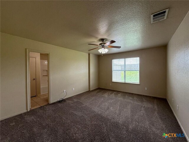3608 Doffy Dr, Killeen, TX 76549 - carpeted empty room with a textured ceiling, baseboards, a ceiling fan, and visible vents