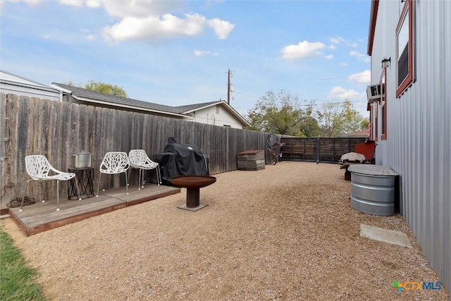 view of yard with a wooden deck