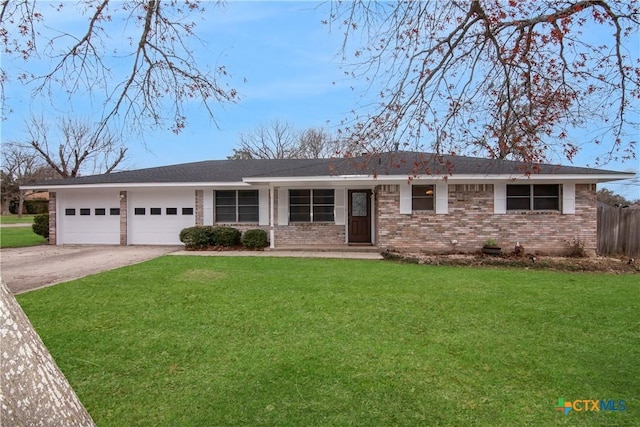 ranch-style house with a garage and a front yard