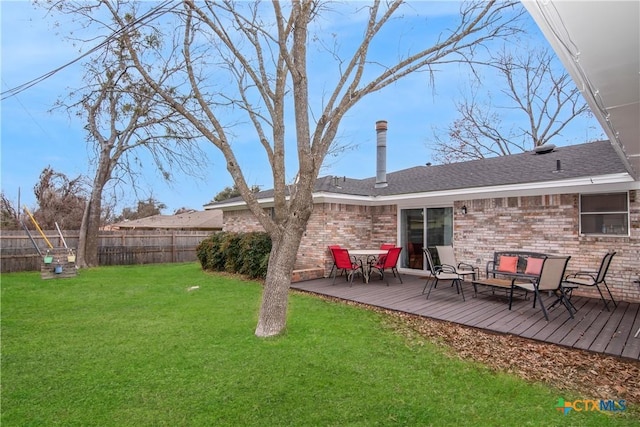 view of yard featuring a deck