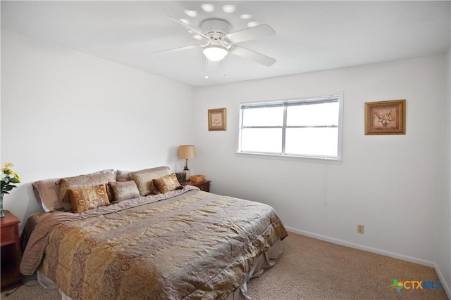 bedroom featuring ceiling fan and carpet flooring