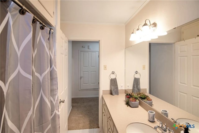 bathroom featuring vanity and crown molding