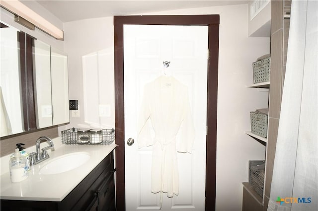 bathroom featuring vanity