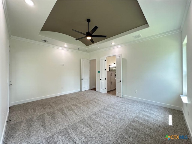 425 Dos Rios Dr, Belton, TX 76513 - unfurnished bedroom featuring a tray ceiling, crown molding, carpet floors, baseboards, and recessed lighting