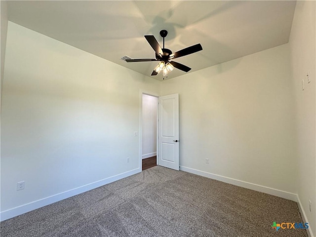 425 Dos Rios Dr, Belton, TX 76513 - spare room featuring baseboards, a ceiling fan, and dark colored carpet