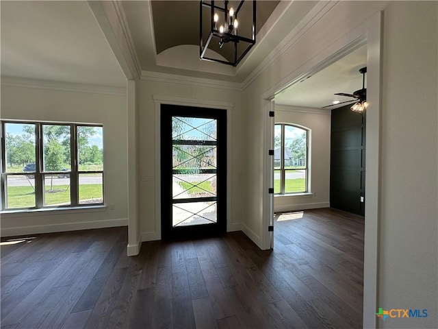 425 Dos Rios Dr, Belton, TX 76513 - entrance foyer with ornamental molding, baseboards, a chandelier, and dark wood-style flooring