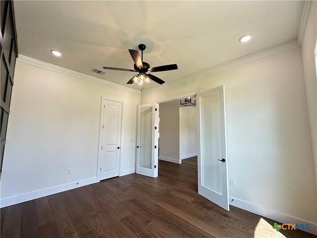 425 Dos Rios Dr, Belton, TX 76513 - unfurnished bedroom with baseboards, dark wood-style floors, ornamental molding, french doors, and recessed lighting