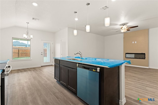 5113 Rose Petal Ct, Killeen, TX 76542 - kitchen with dishwasher, a sink, light wood-type flooring, open floor plan, and lofted ceiling