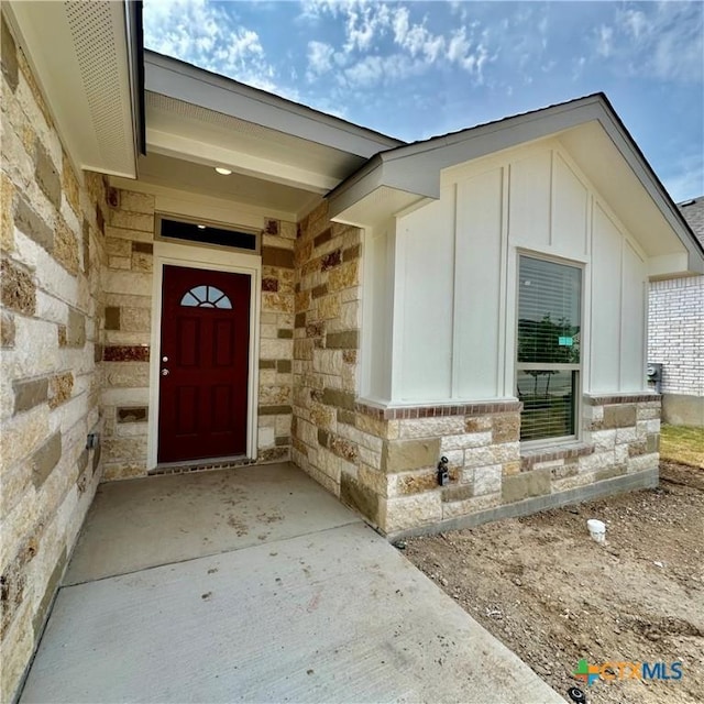 5113 Rose Petal Ct, Killeen, TX 76542 - property entrance with stone siding and board and batten siding