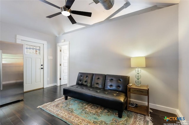 living area featuring ceiling fan, dark hardwood / wood-style flooring, and lofted ceiling